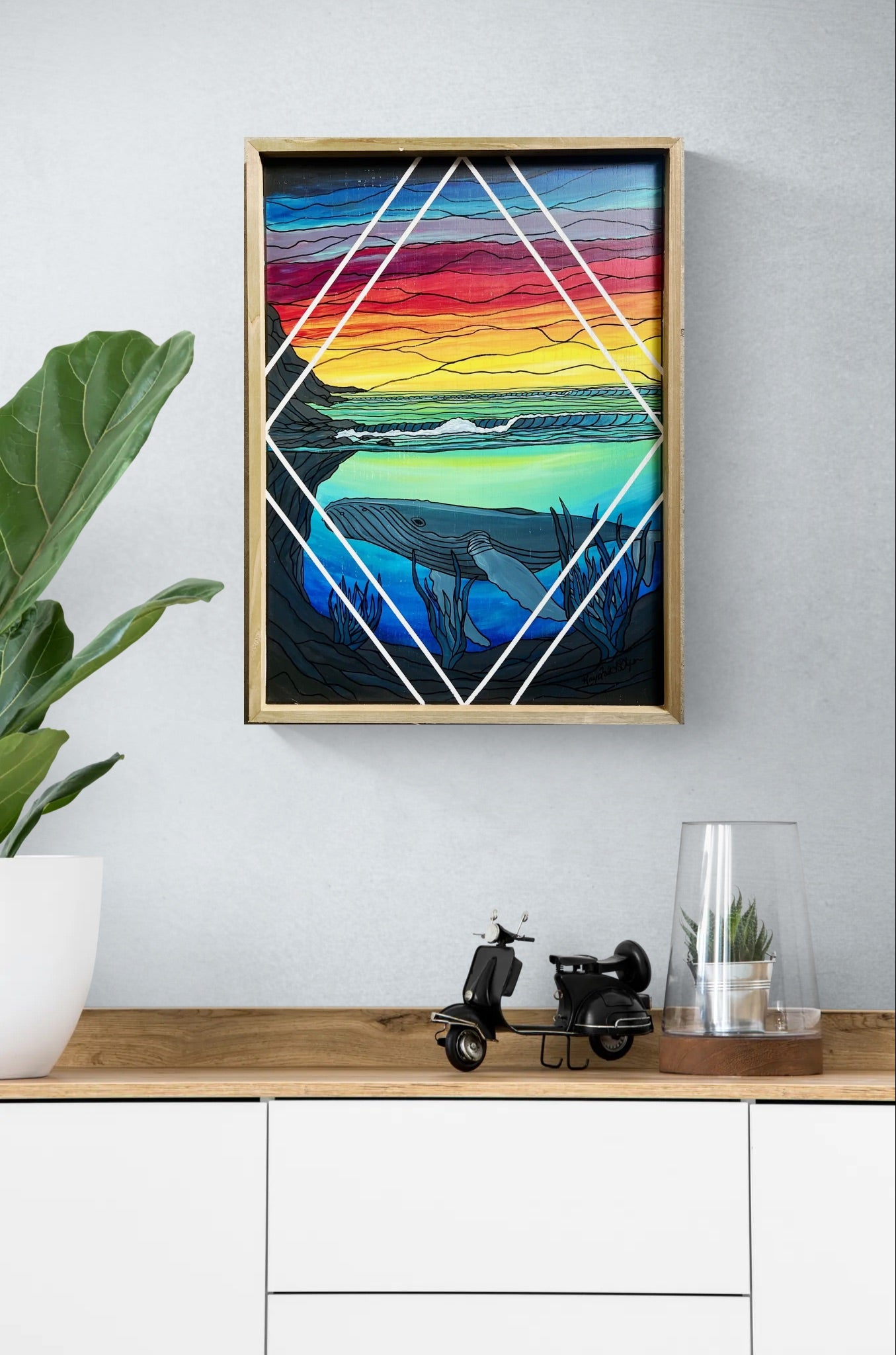 Stained glass whale at sunset