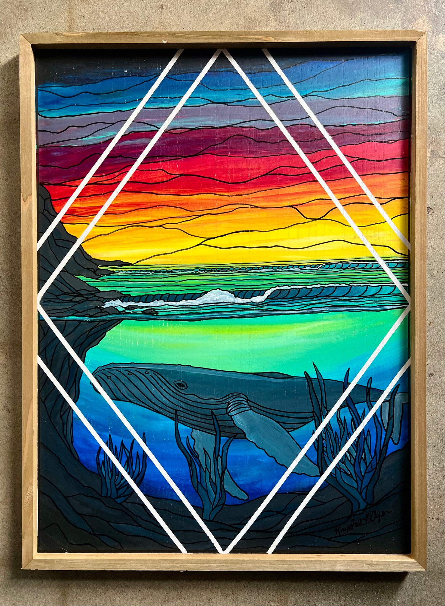 Stained glass whale at sunset